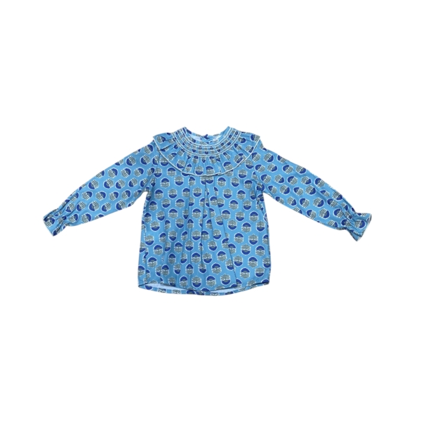 Blusa Hortensia infantil de manga larga con estampado floral azul. Hecha en España. Tallas de 4 a 8 años
