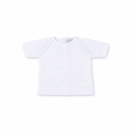 Jersey de punto para bebé en color blanco de manga corta, marca Machú, hecho a mano en España con 100% algodón y detalles calados.