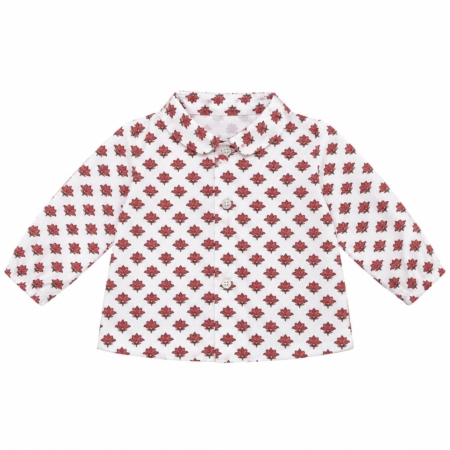 Vista frontal de la blusa Copenhague con estampado floral y cuello bebé para niña, elaborada en España.