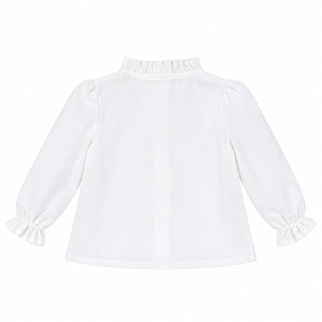 Vista posterior de la blusa Luisa de niña confeccionada en 100% algodón con acabados de alta calidad.
