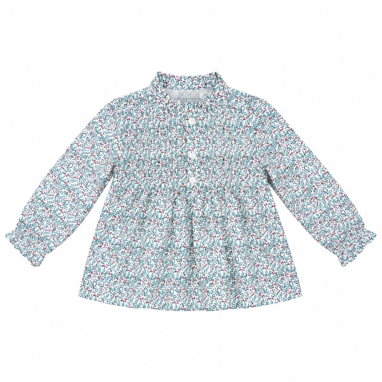 Vista frontal de la blusa infantil Virginia confeccionada en tejido 100% algodón con estampado floral multicolor, cuello alzado, jaretas delanteras y manga larga, producto elaborado en España.