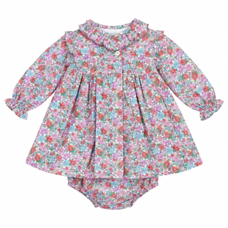 Jesusito infantil 100% algodón con estampado floral multicolor, cuello con volantes y cubrepañal a juego para niña de 1 a 3 años, producto elaborado en España.