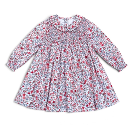 Vista frontal del vestido de algodón con traseros y falda de vuelo con estampadores de flores.