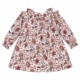 Vestido infantil de manga larga con estampado floral en tonos caldera, azul y teja, cuello con volantes y corte fruncido para niña de 3 a 8 años, producto elaborado en España.